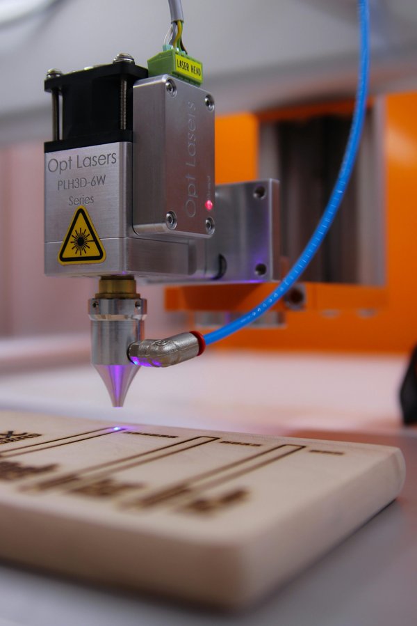 Gravure laser bois personnalisée : l'art écologique et sur mesure